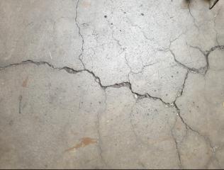 reprise de fissure épaufrées dalle de béton 